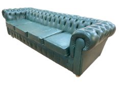 Bottle green deep buttoned leather four seater Chesterfield settee, 264cm.