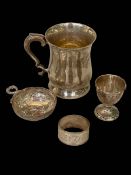 Silver tankard, Sheffield 1949, silver wine taster, egg cup and napkin ring (4).