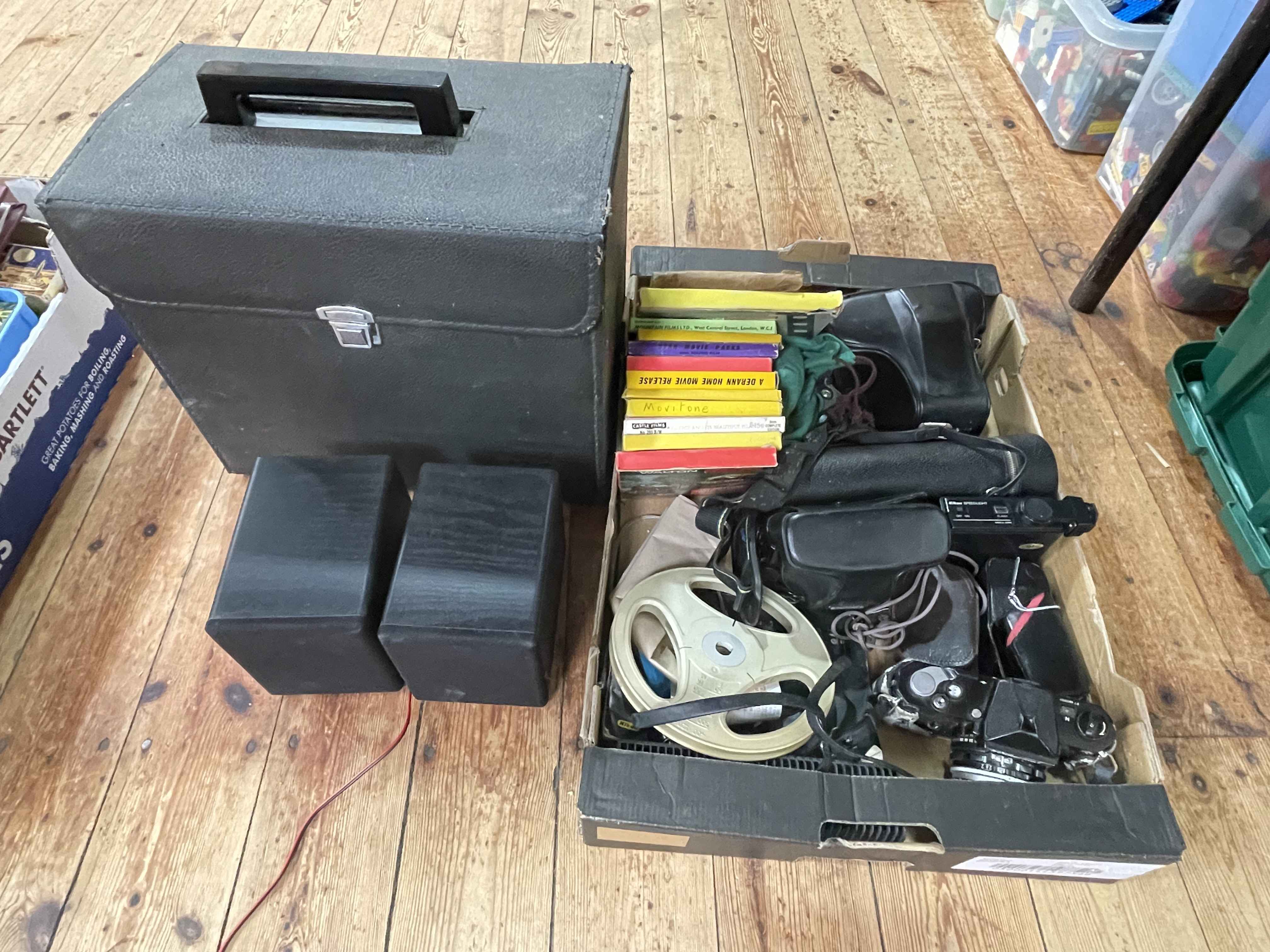 Elmo ST-1200 sound projector, two Nikon cameras with lenses, 90-230 zoom lens, Konica camera,