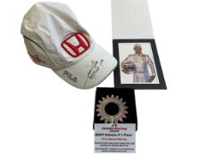 Signed Jensen Button cap, photo and Honda Racing team 2007 Honda F1 part '7th Gear Ratio'.