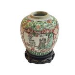 Chinese famille verte baluster jar decorated with panels on floral ground,