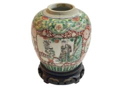 Chinese famille verte baluster jar decorated with panels on floral ground,