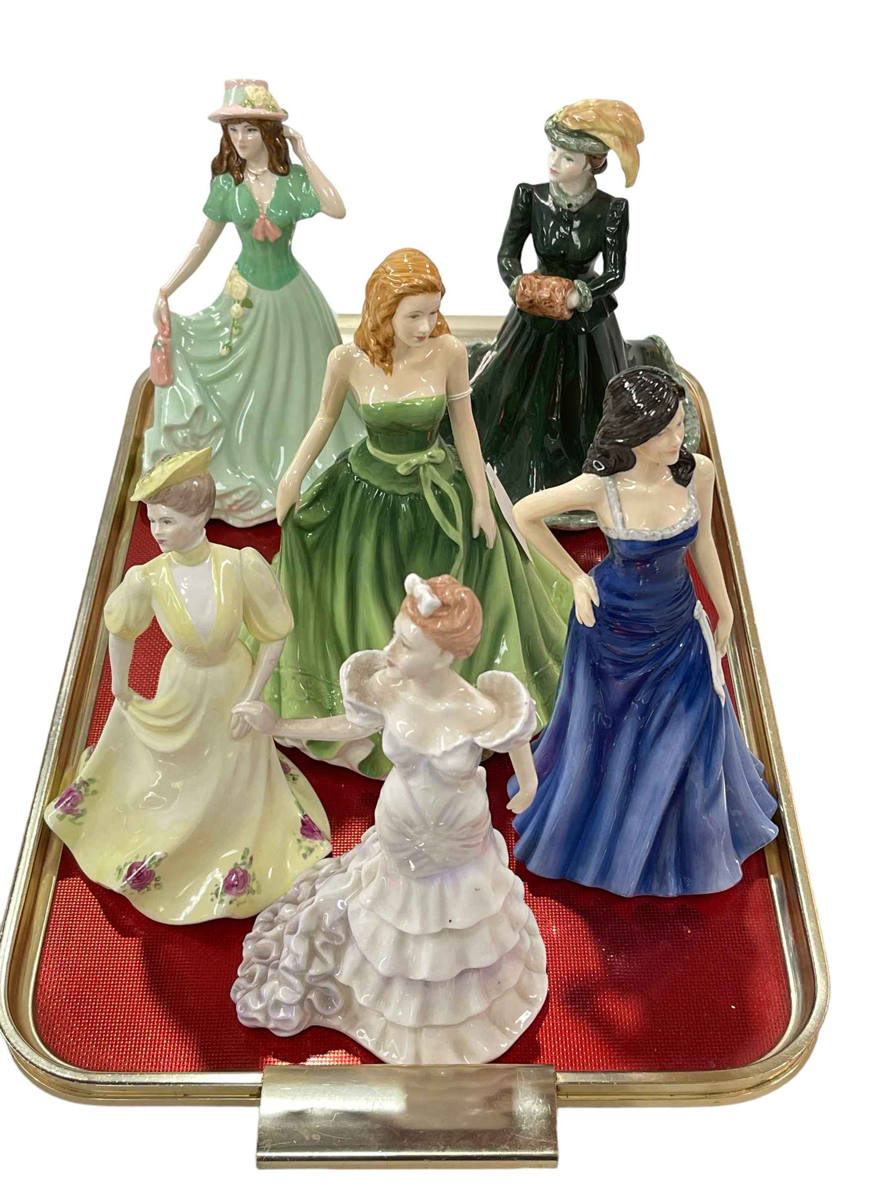 Three Coalport ladies, Royal Doulton and two The English Ladies Co figures (6).