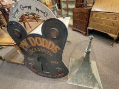 Wooden sign 'PW Dodds, Locksmith Pendleton' and tannoy speaker.