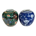 Blue and white Chinese prunus ginger jar and dragon decorated ginger jar.