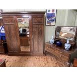 Robson & Sons, Newcastle, early 20th Century mahogany triple door wardrobe and dressing table,