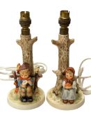 Pair Hummel boy and girl table lamps, 24cm.