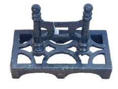 Cast iron footscraper.