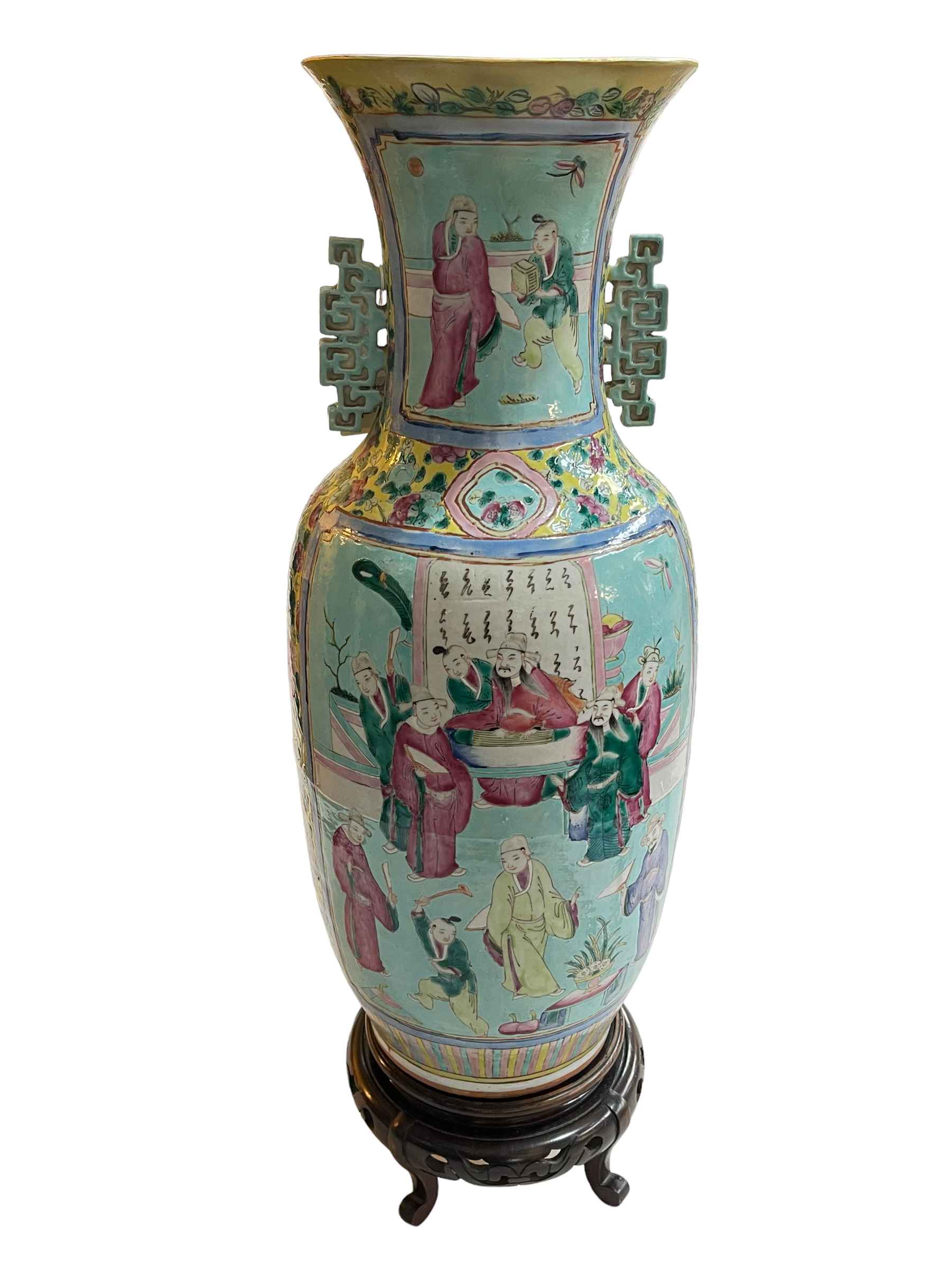 Large Chinese Famille Rose two handled vase decorate with figures on carved wood stand,