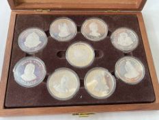 Cased Queens of the British Isles sterling silver medals and cased Matchbox Connoisseurs Collection.