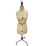 Vintage eight section dress makers dummy on triform stand.