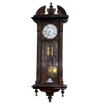 Walnut and ebonised double weight Vienna wall clock, 118cm.