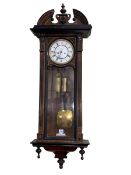 Walnut and ebonised double weight Vienna wall clock, 118cm.