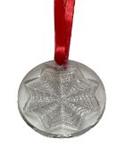 Lalique Christmas Star, boxed, 6.5cm diameter.