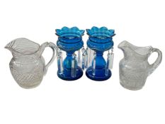 Pair Victorian blue glass lustres and two 19th Century glass jugs (4).