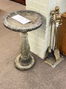 Weathered pedestal bird bath and brass companion set.