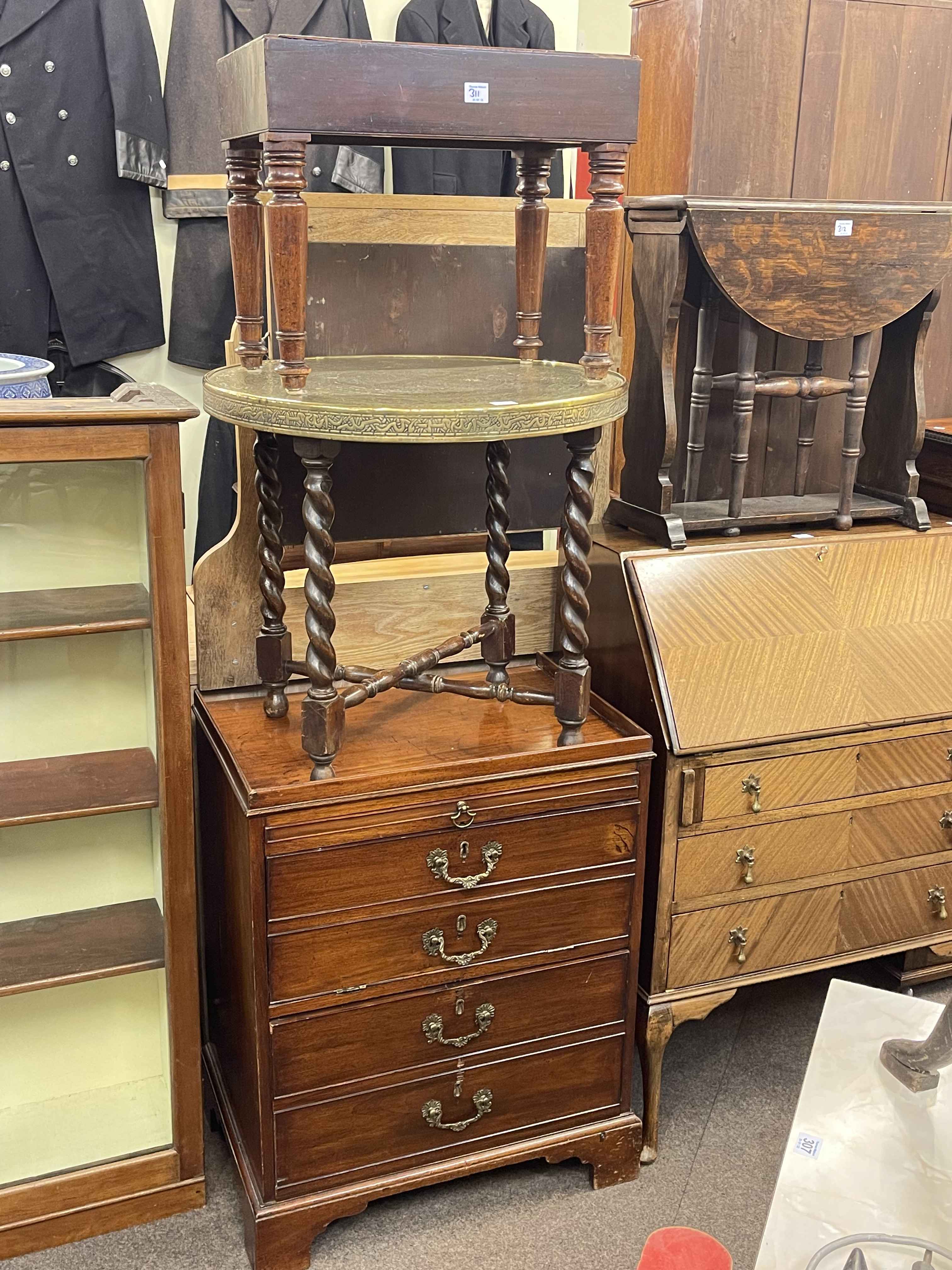 Georgian mahogany chest having slide above a fall front and deep drawer,