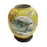 Chinese yellow glazed vase decorated with three circular panels depicting figures,