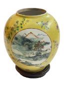 Chinese yellow glazed vase decorated with three circular panels depicting figures,