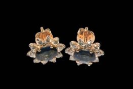 Pair of sapphire and diamond cluster earrings set in 18 carat yellow gold, sapphire weight approx 1.