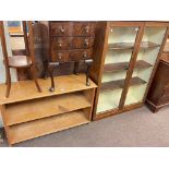 Low pine two tier open bookcase and two door glazed bookcase (2).