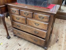Bevan Funnell Ltd Reprodux oak chest of seven drawers on bun feet, 79cm by 92cm by 45cm.