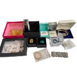 Collection of jewellery including Swarovski, 9 carat gold earrings, and Armani wristwatch.