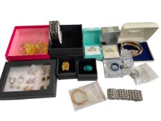 Collection of jewellery including Swarovski, 9 carat gold earrings, and Armani wristwatch.