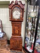 Antique mahogany cased eight day longcase clock having painted arched dial, 225cm.