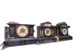 Three slate and marble mantel clocks.