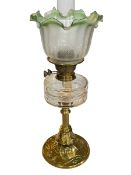 Art Nouveau brass and glass oil lamp with etched frosted green tinted glass shade, 60cm high.