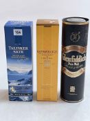 Three bottles of whisky, Talisker Skye and Glenmorangie Single Malts and Glenfiddich Pure Malt.