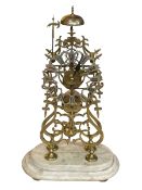 Brass skeleton clock on stone plinth, lacking dome, 49cm.