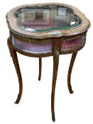 Continental gilt and brass mounted shaped top bijouterie table, 74cm by 52cm by 52cm.