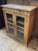 Oak two door glazed cabinet, 90.5cm by 73cm by 32cm.