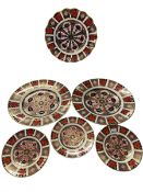 Royal Crown Derby Old Imari fluted plate, 22cm, three tea plates and two seconds dinner plates.