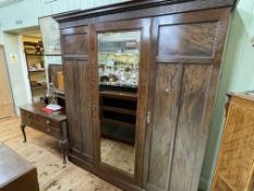 Robson & Sons, Newcastle, early 20th Century mahogany triple door wardrobe and dressing table,