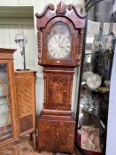 Antique mahogany cased eight day longcase clock having painted arched dial, 225cm.