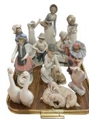 Four Lladro groups and advert, and six Nao and other figures (11).