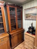 Victorian mahogany two door side cabinet and associated glazed door bookcase top,