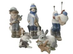 Five Lladro pieces including Puppet Boy, Skiing and Hunter Puppet.