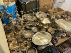 Assortment of silver plated wares including cruets, candelabra's, tureens, candle holders,