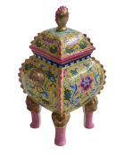 Chinese pottery four legged censor with floral and gilt design on yellow and pink ground,