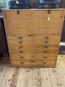 Pine escritoire, the fall front enclosing a series of drawers,