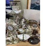 Collection of Continental Cupid and figural porcelain including oil lamp and clock,