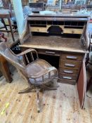 Early 20th Century oak single pedestal roll top desk, 114cm by 106cm by 75cm,