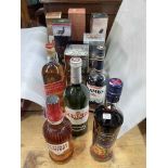 Eleven bottles of spirits including Johnnie Walker Red Label 1 litre,
