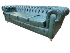Bottle green deep buttoned leather four seater Chesterfield settee, 264cm.