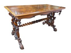 Victorian rectangular walnut centre table raised on carved ends, joined by twist stretcher,