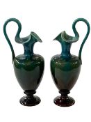 Pair of Linthorpe pottery ewers, shape number 1936, 29cm.